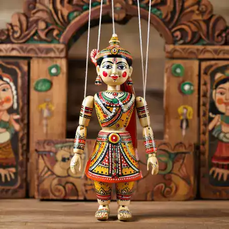 Custom designed marionette puppet created for theater production with unique costume and character details approved by client through consultation process